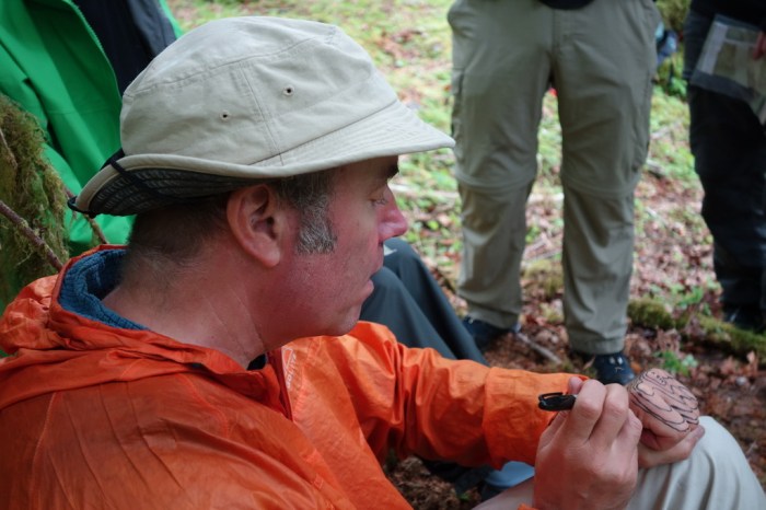 Mike Clelland draws a topo map on his hands