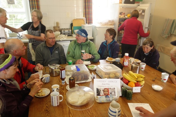 Enjoying hot tea and biscuits