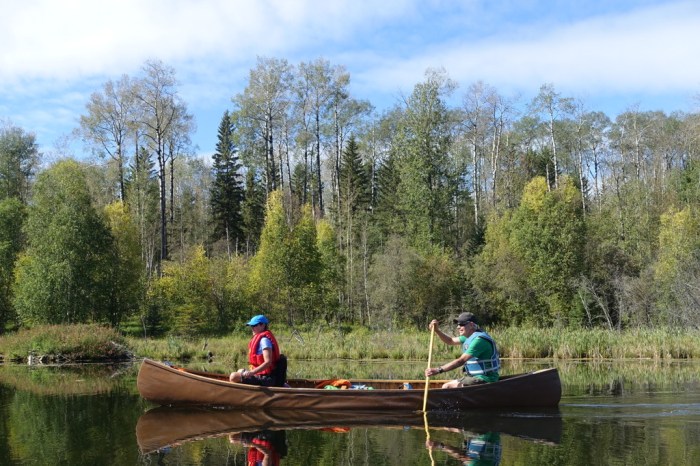 September - Canoeing peaceful lakes in Alberta