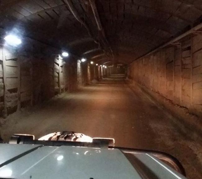 Driving deep into the mine Photo credit: Queenstown Heritage Tours
