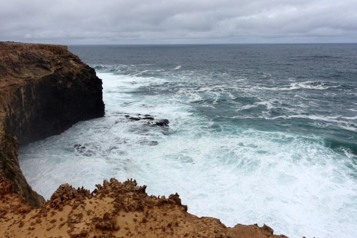 Basalt cliffs overlook dangerous waters